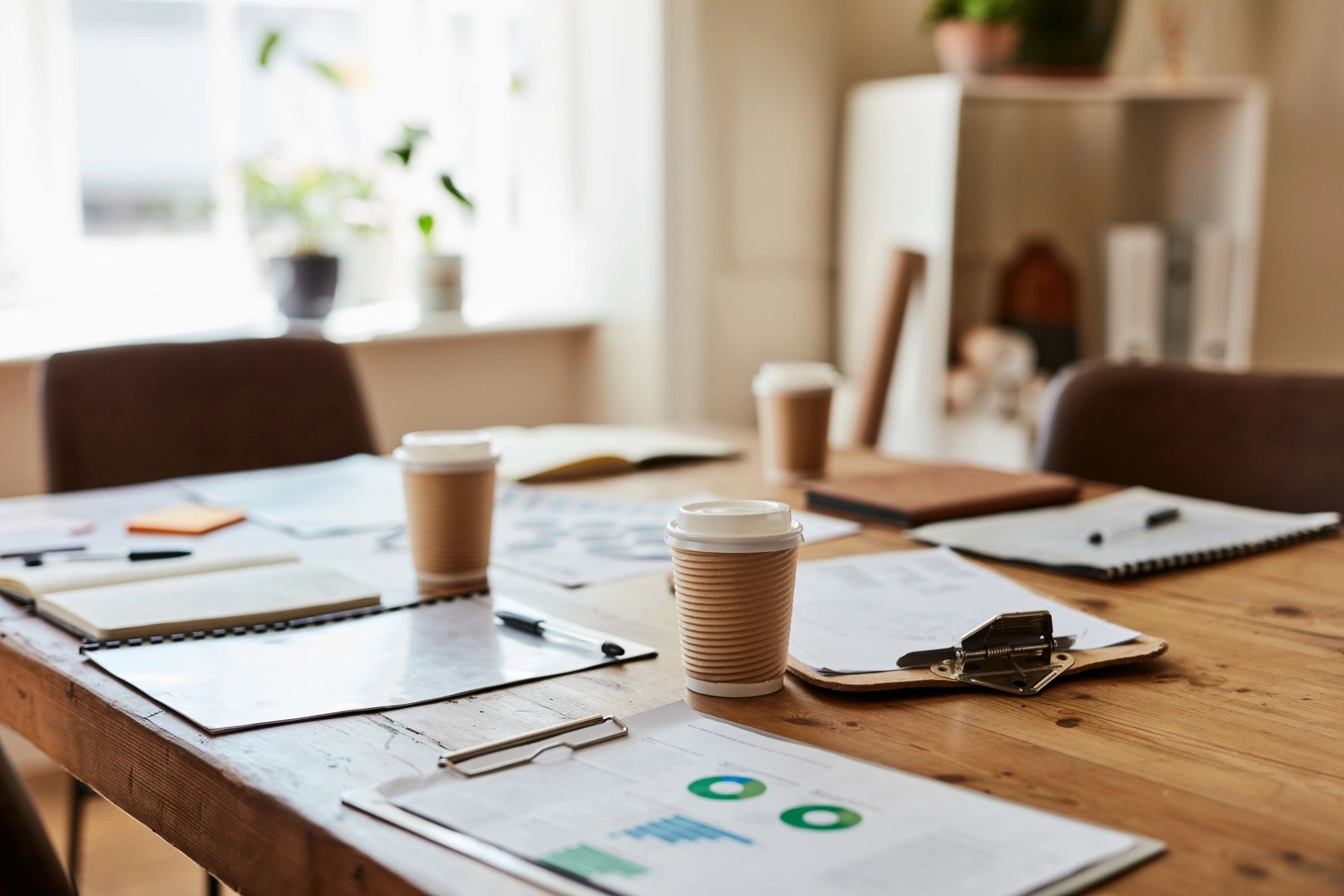 Planning documents on a meeting table